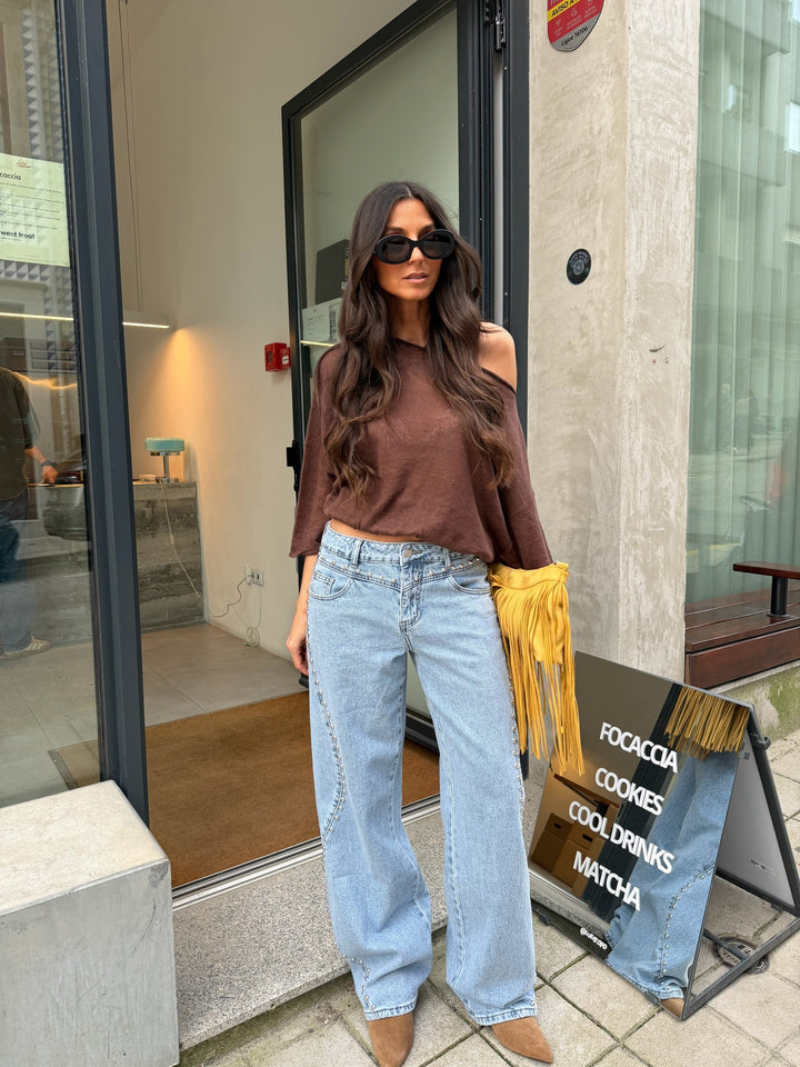 Jeans de denim con tachuelas