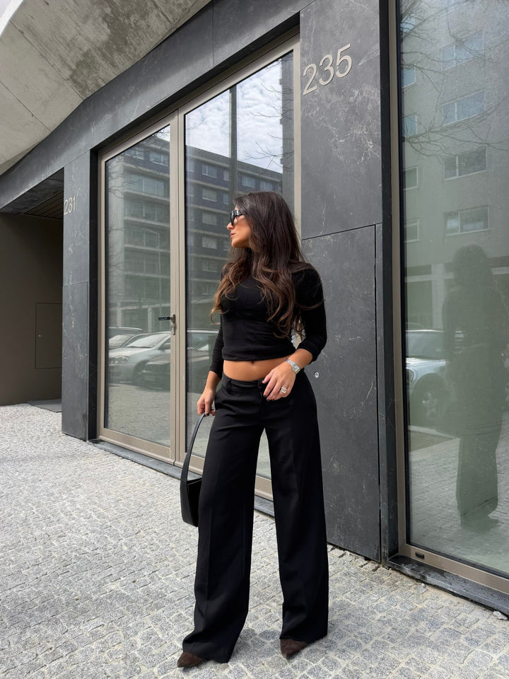 Pantalones de tiro bajo Carolyn en negro
