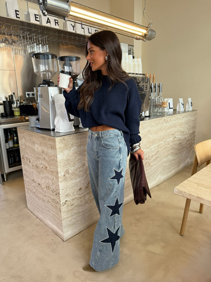 Vaquero denim con estrella negra