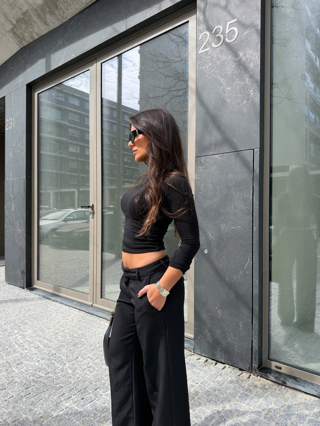 Pantalones de tiro bajo Carolyn en negro