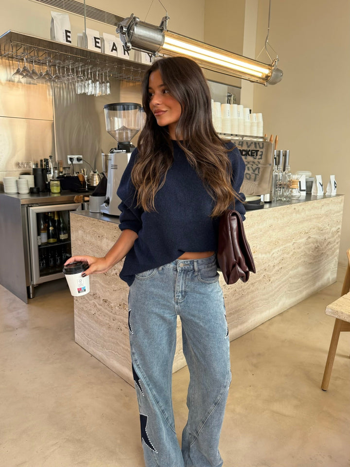 Vaquero denim con estrella negra