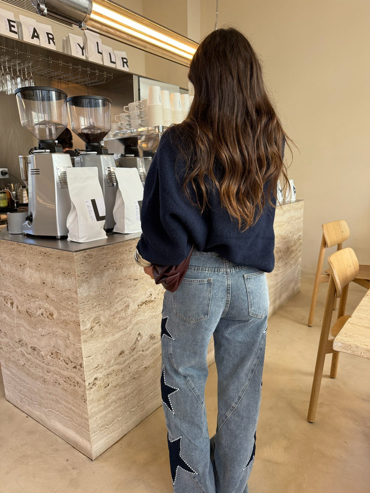 Vaquero denim con estrella negra