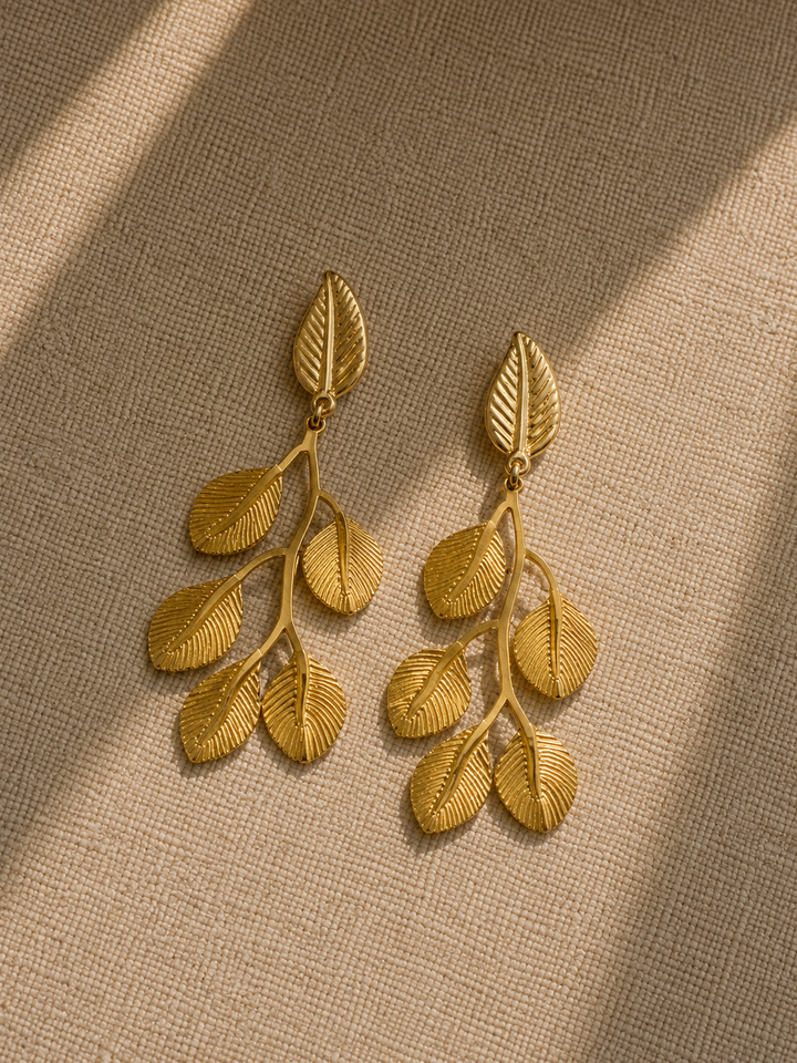 Pendientes hojas relieve dorados
