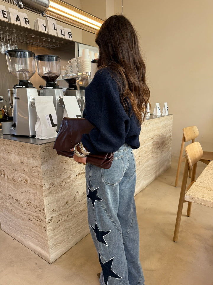 Vaquero denim con estrella negra