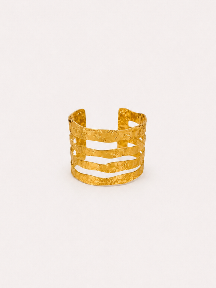 Brazalete bandas picadas dorado