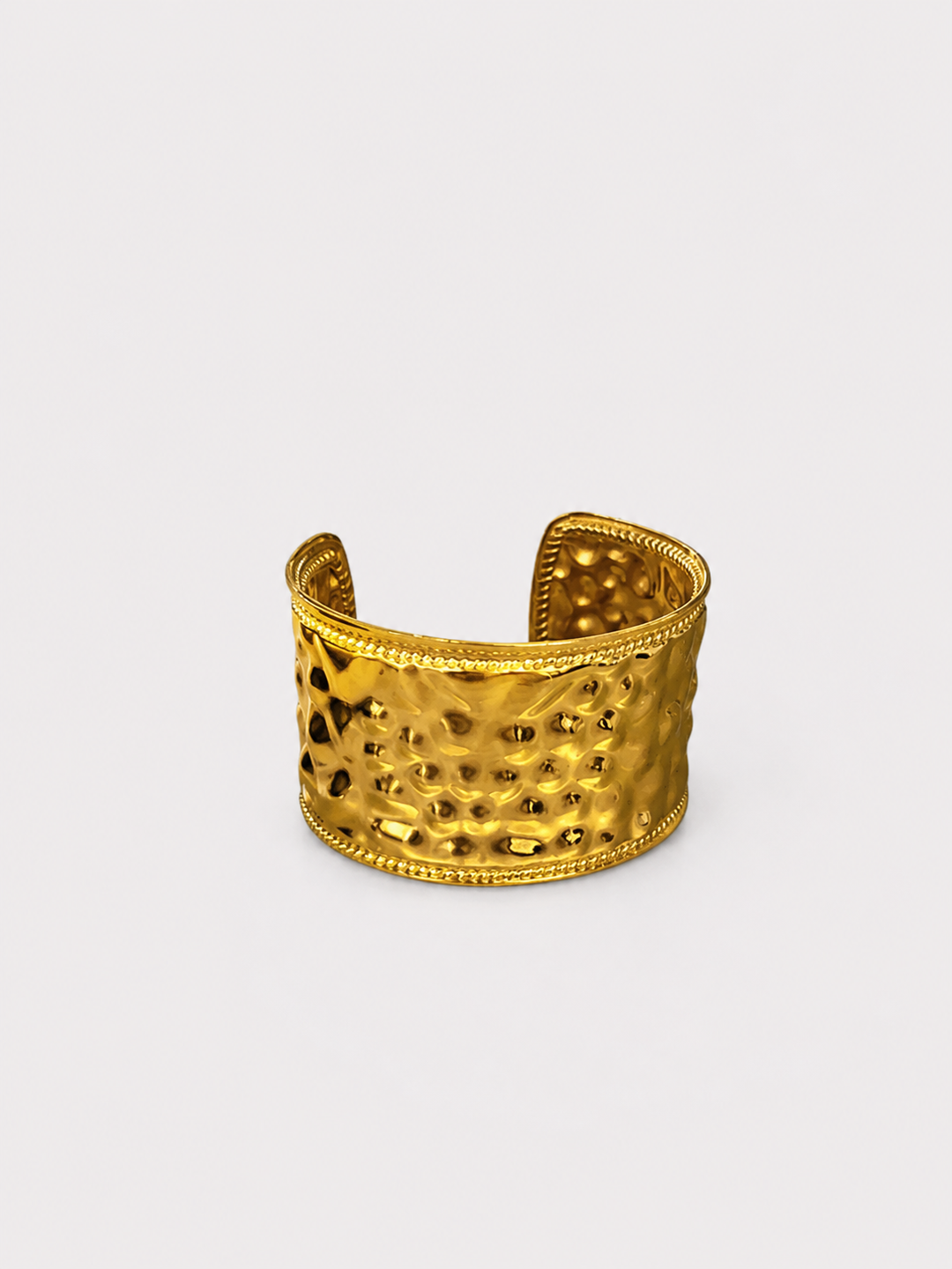 Brazalete efecto picado dorado