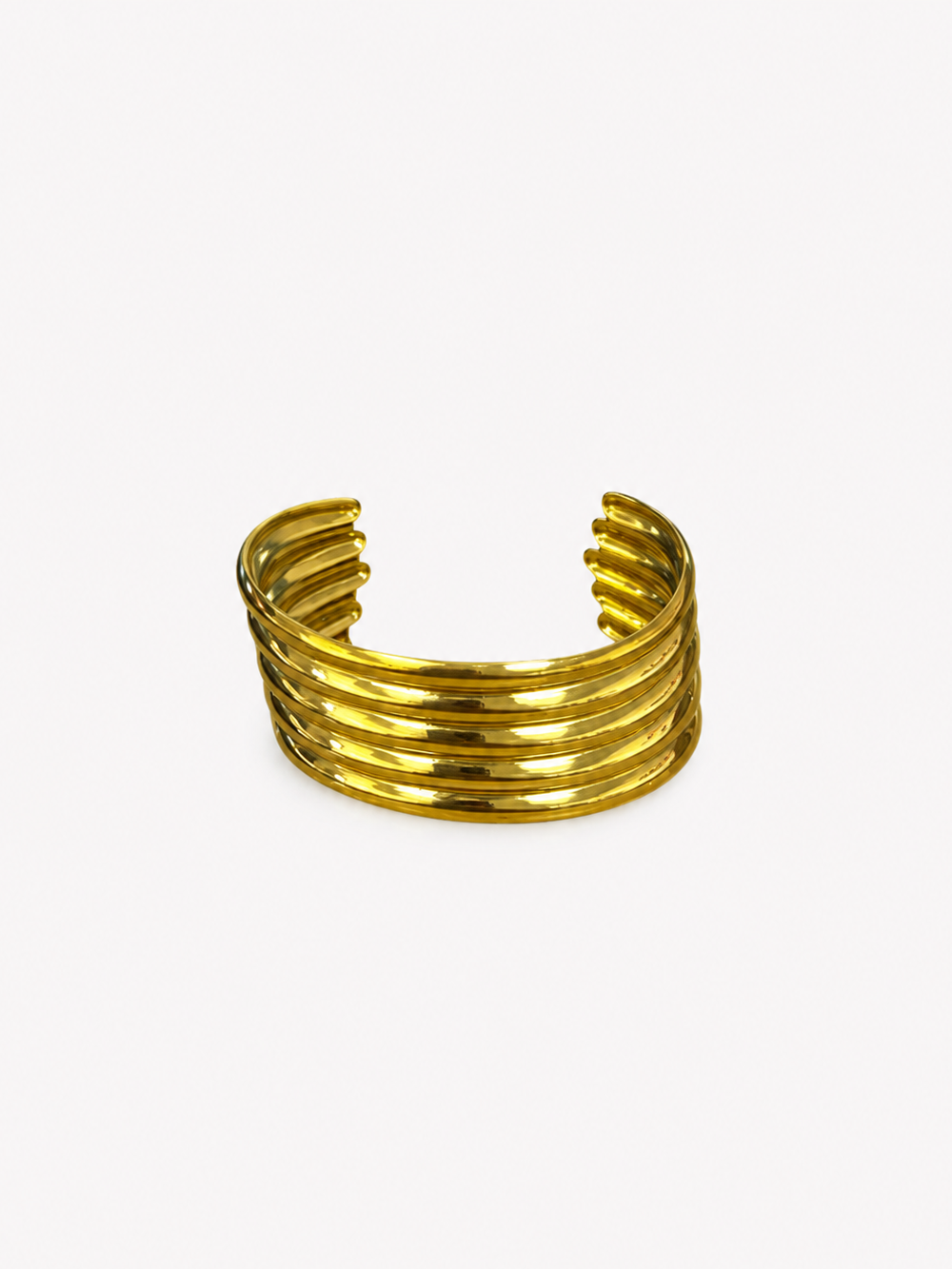 Brazalete aros asimétrico dorado