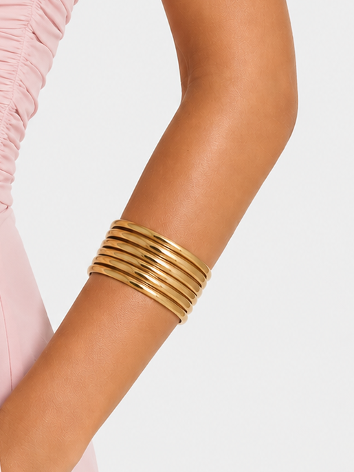 Brazalete aros asimétrico dorado