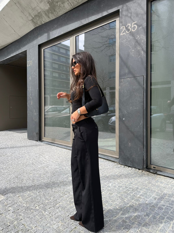 Pantalones de tiro bajo Carolyn en negro