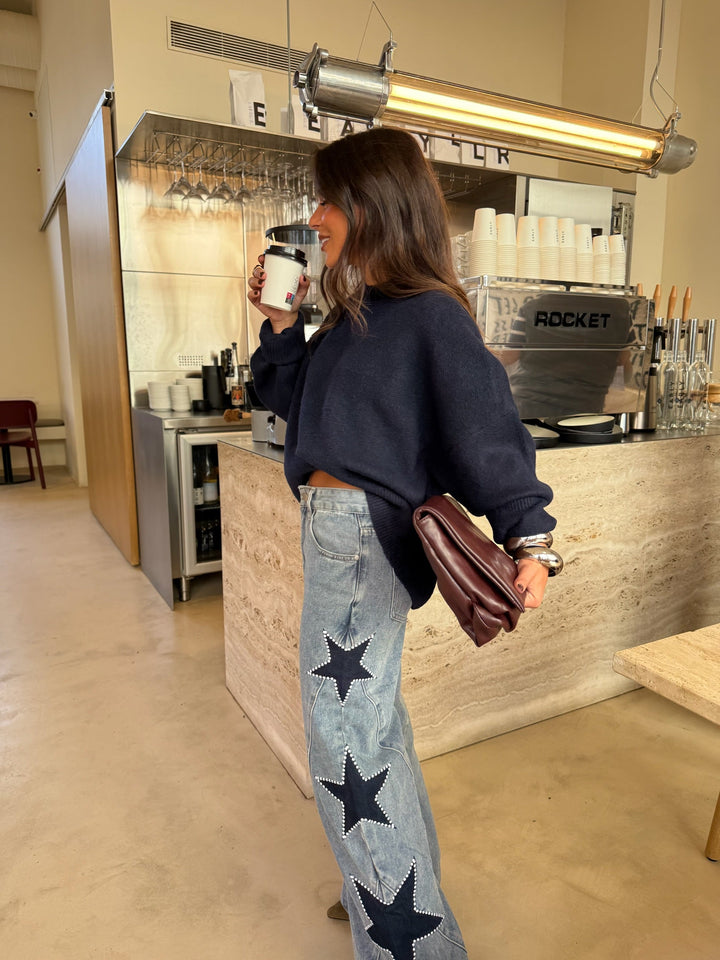 Vaquero denim con estrella negra