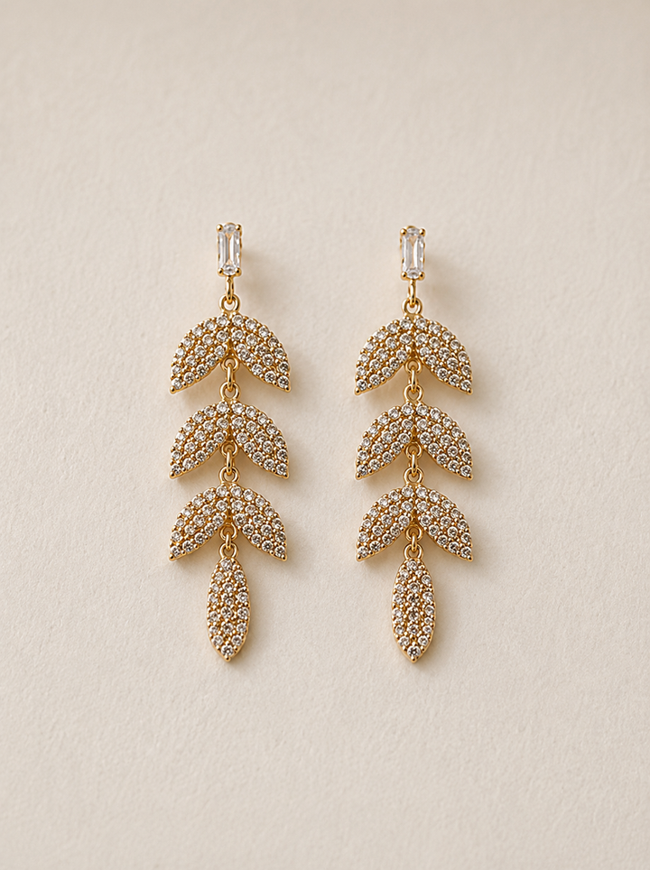 Pendientes hojas brillantes dorados